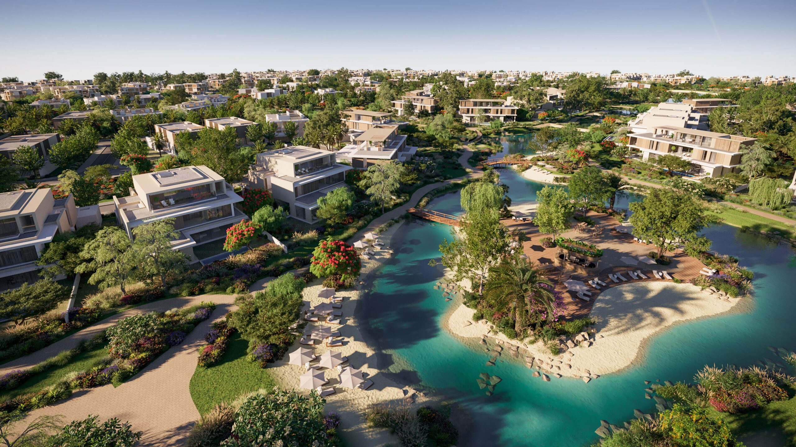 Developer illustration of The Acres villas beside landscaped paths and lagoons